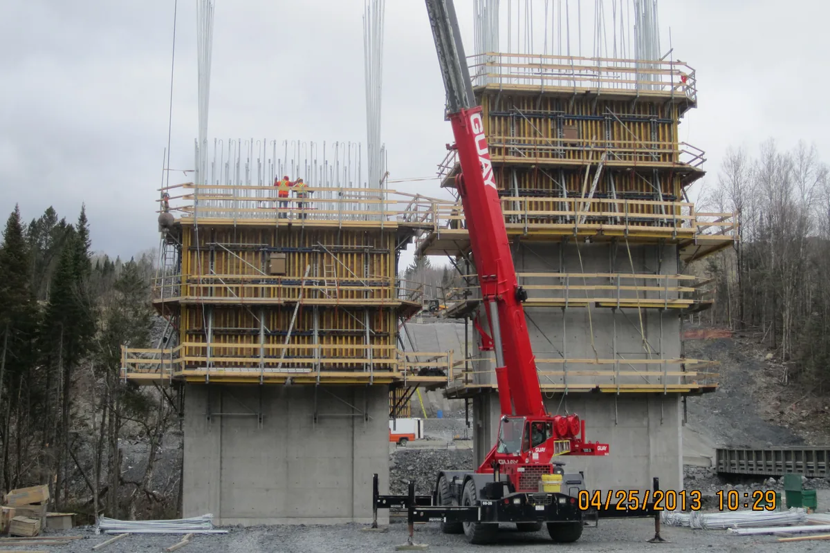 Pier formwork panel lifted by mobile crane