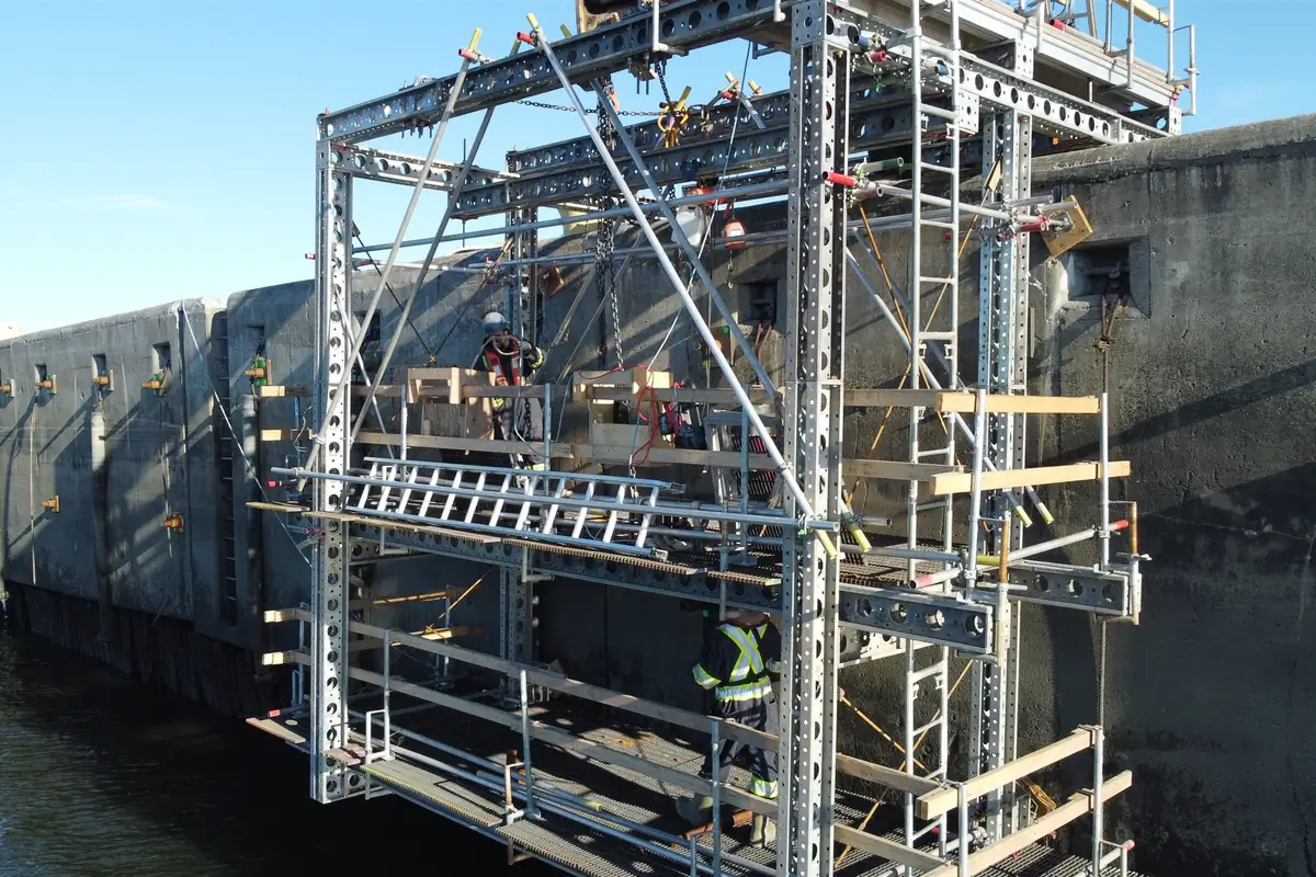 Crew at work on the suspended platform